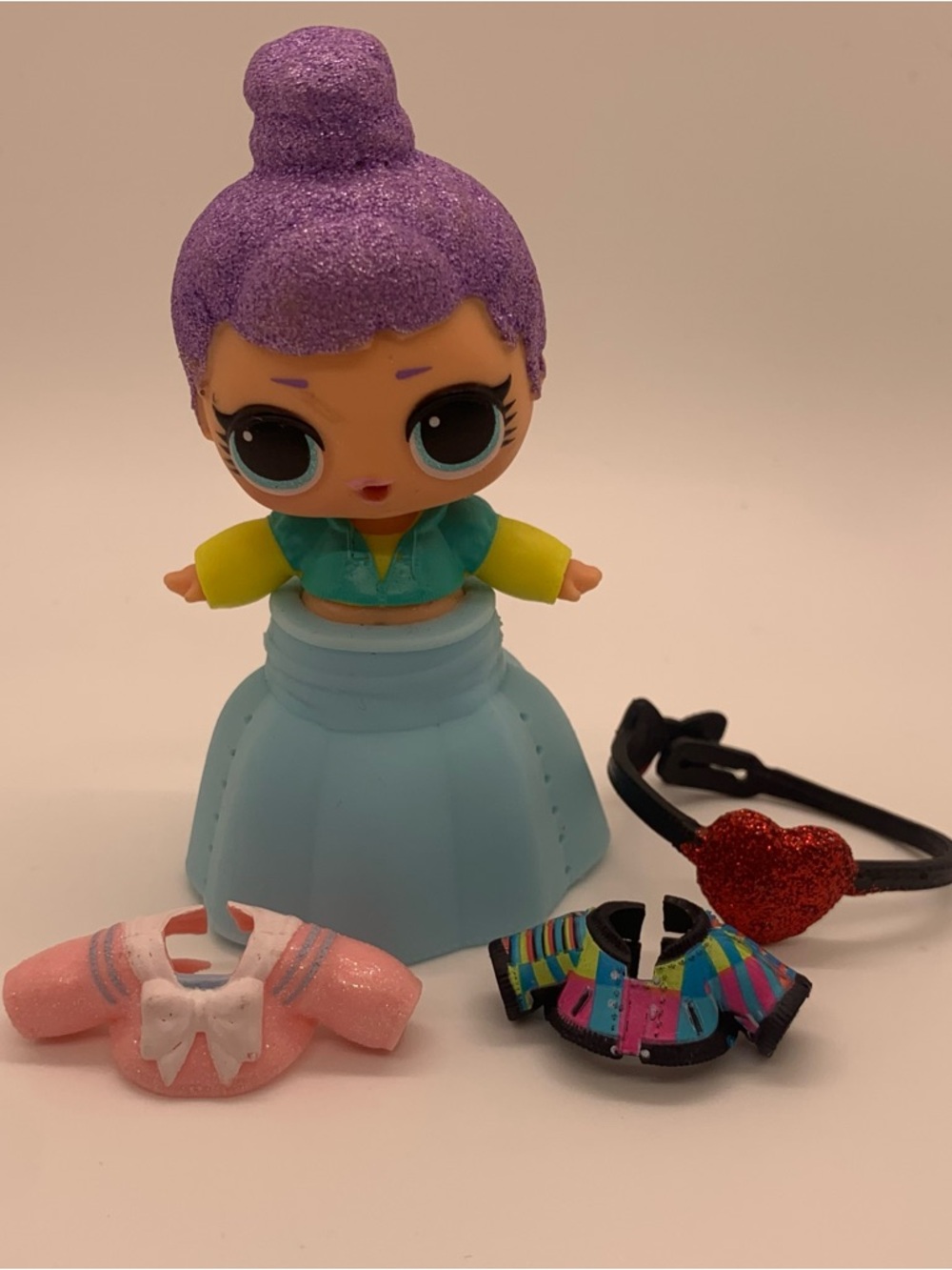 L.O.L. Surprise! Purple-Haired Doll with Blue Skirt and Accessories